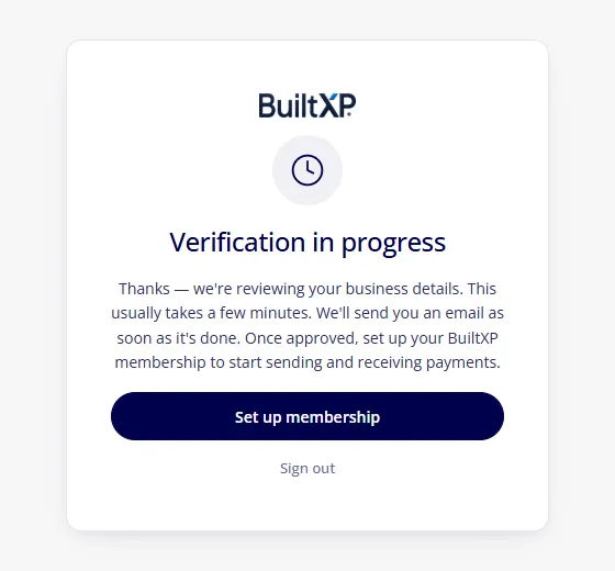 The BuiltXP verification-in-progress screen with a Set up membership button
